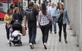 People walking on the pavement in London. Credit: istock.com/claudiodivizia